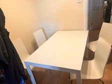 White Table And 4 Chairs