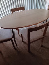 Oval table with four matching